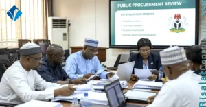 Government procurement reform meeting reviewing public procurement contracts and bid evaluation